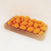 Миндаль в оранжевой «манго» шоколадной глазури Россия